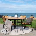 KARRIGE - Table de jardin ronde 130cm plateau en lames de teck et pieds métal noir