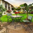 BAHIANA - Table pliante métal laqué gris et plateau en verre trempé effet bois