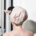Bonnet de douche avec boite à suspendre par ventouses