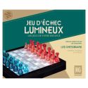 Jeu d'échec transparent avec pions rouges et bleus et éclairage LED