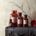 Bougie XXL en verre marron parfum pivoine (H25cm)