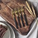 Set 4 fourchettes à dessert inox doré manches noirs en plastique