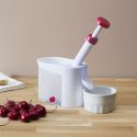 Dénoyauteur à cerises en plastique blanc et rouge