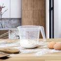 Verre doseur en plastique transparent capacité 1L