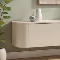 Meuble TV porte abattante suspendu ou à poser au sol finition laqué beige design coins arrondis - LYNA